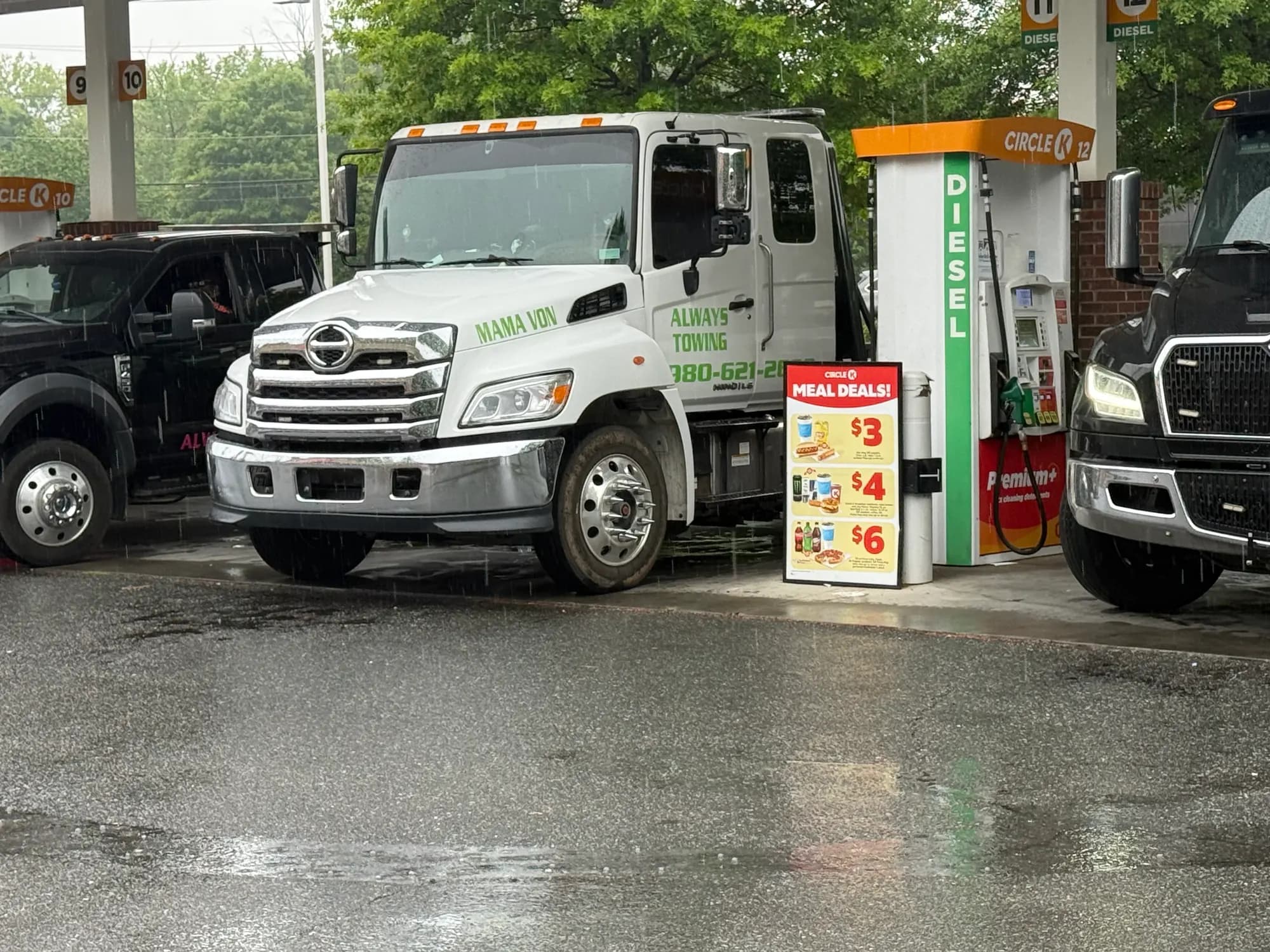 White Hino flatbed tow truck